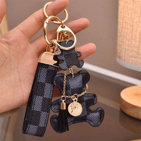 louis vuitton car key holder price|louis vuitton teddy bear keychain.